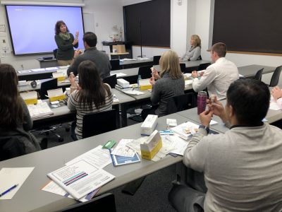 Connecticut community pharmacists learn how to administer a dose of an anti-psychotic drug