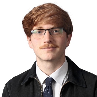 man with glasses smiling